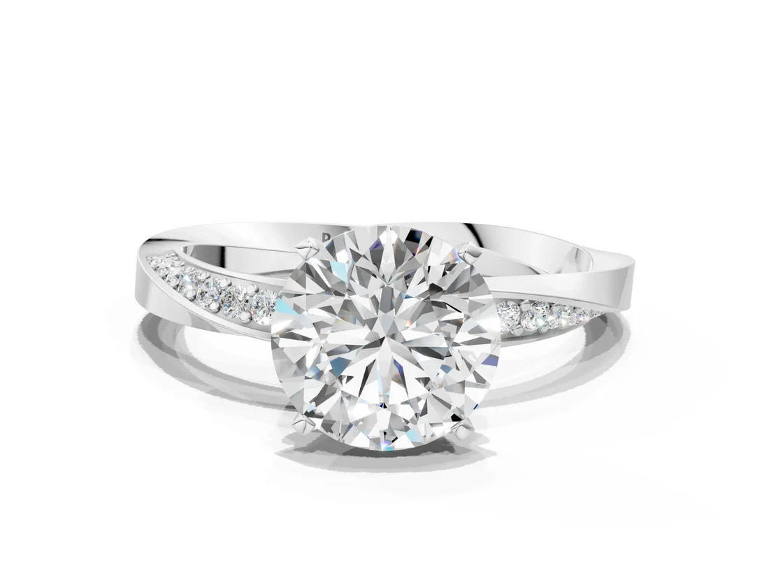 White Gold Round Cut Diamond Engagement Ring with Side Stone Accents and Four-Prong Setting